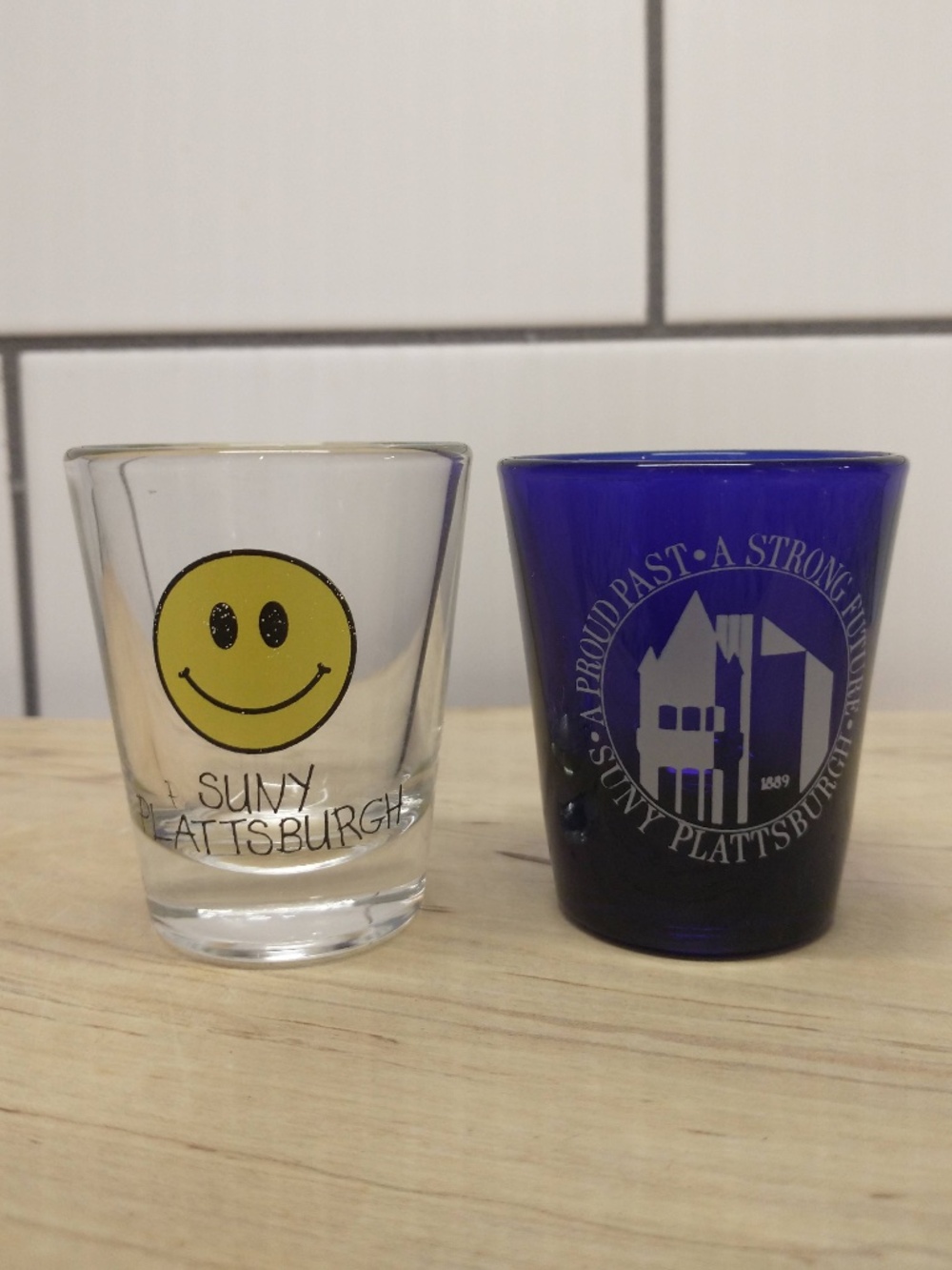 Two SUNY Plattsburgh shot glasses